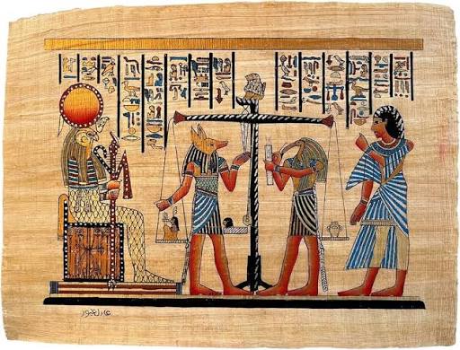 It's an ancient egyptian depiction of the judgement of Osiris