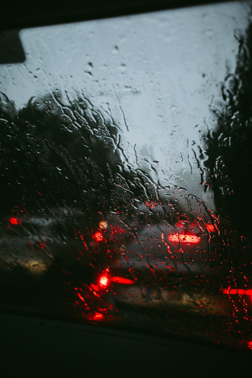 rainy traffic view through car window