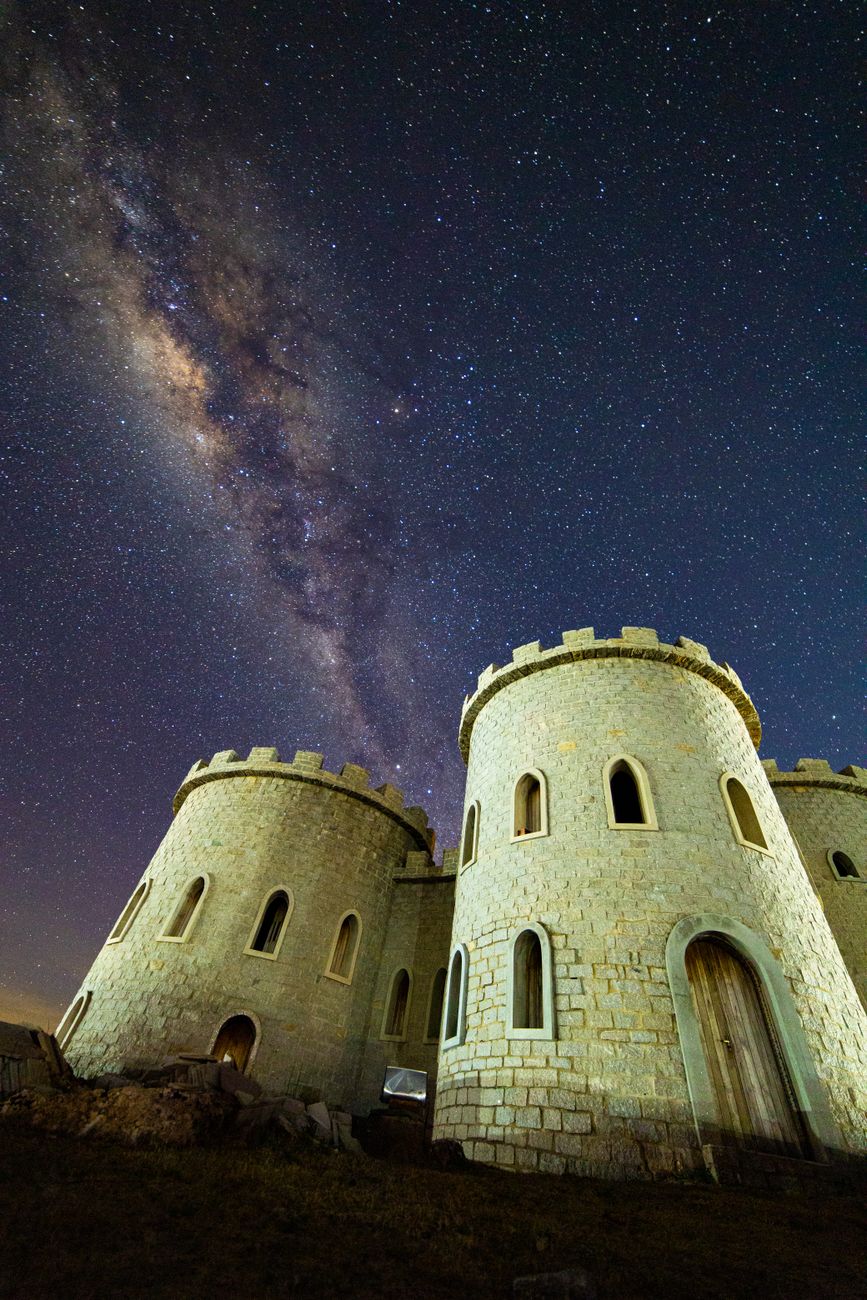 concrete castle under night sky